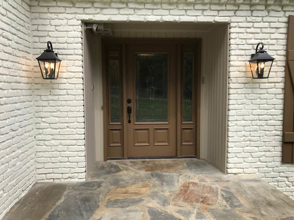 Locksmith diagnosing door handle fault South London