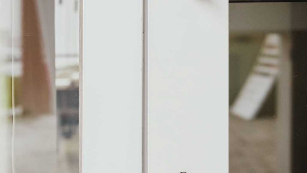 Best door locks for home security UK — close-up of secure front door with high-security cylinder