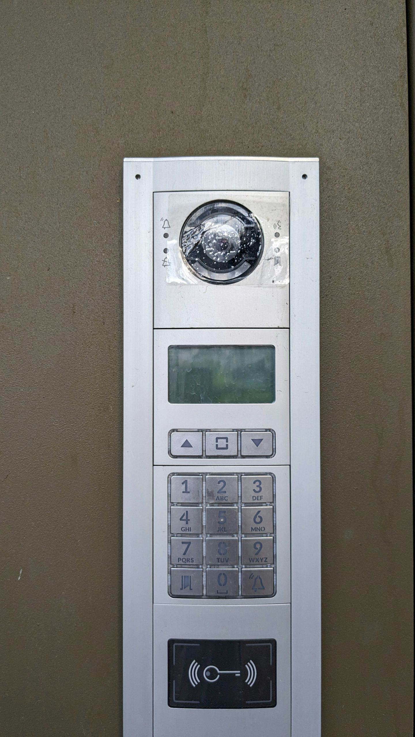 Keyless entry keypad lock fitted to a building entrance in South London