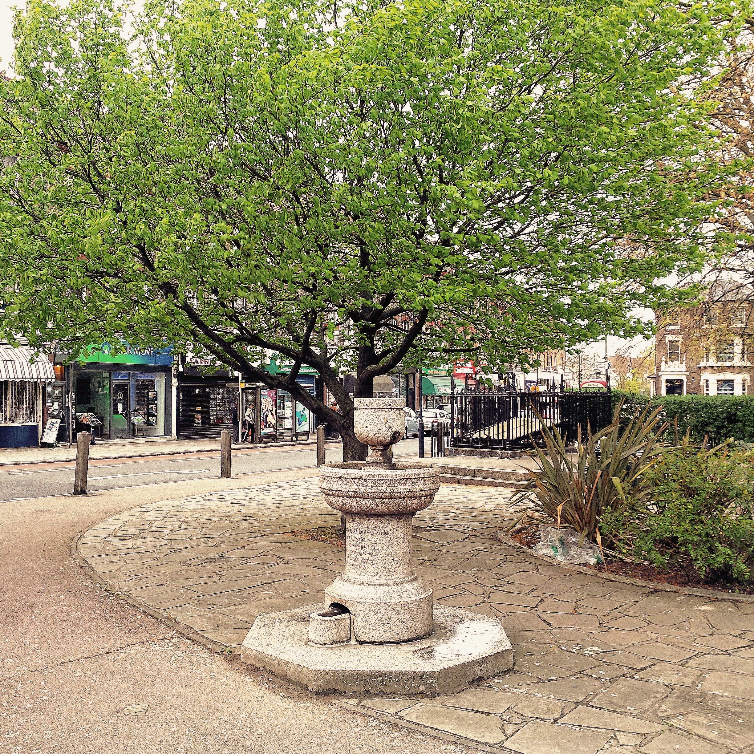 Bartley Park village green and drinking fountain by the shops in Blackheath SE3