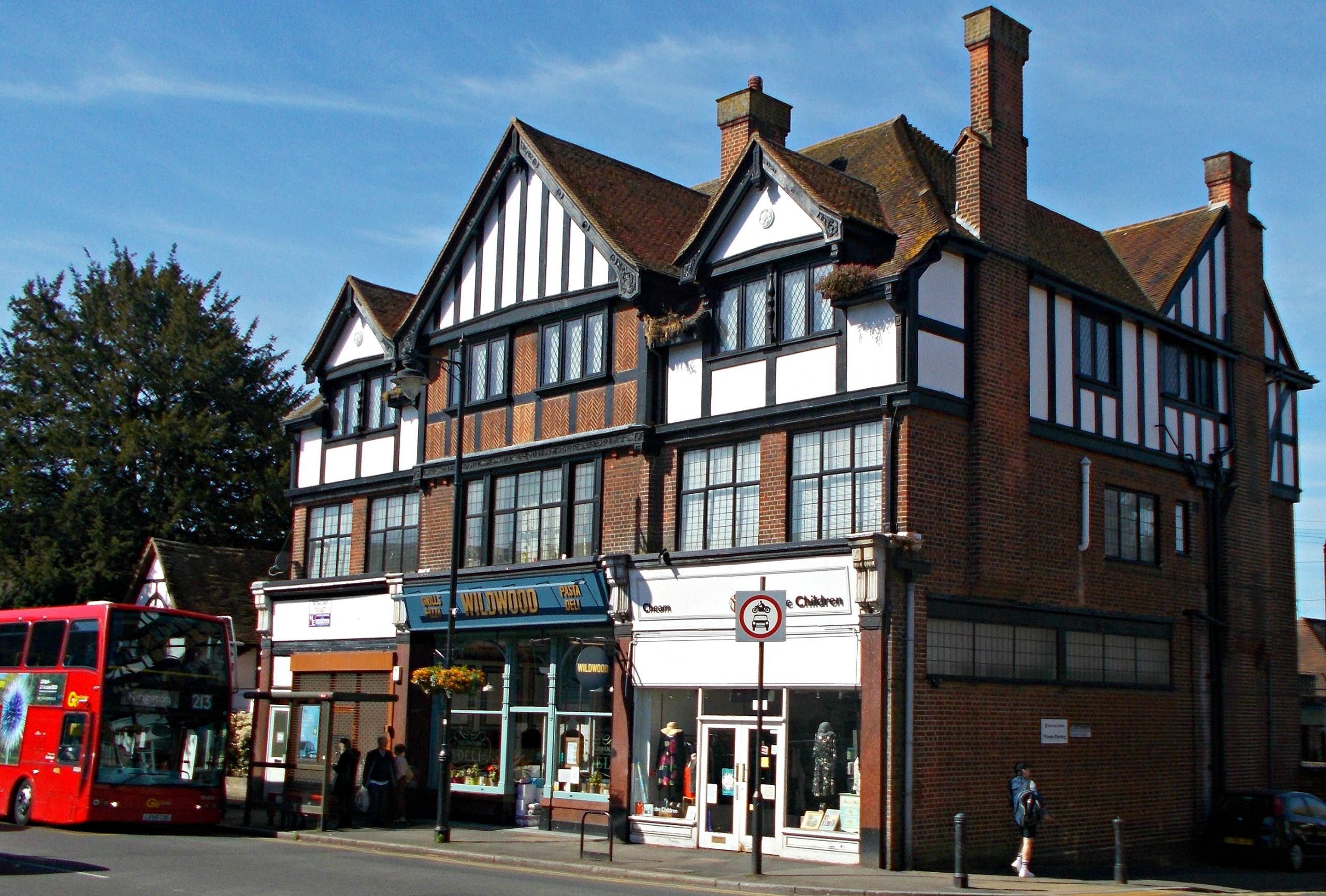 The Broadway shopping parade with Tudor-revival shops in Cheam Village SM3