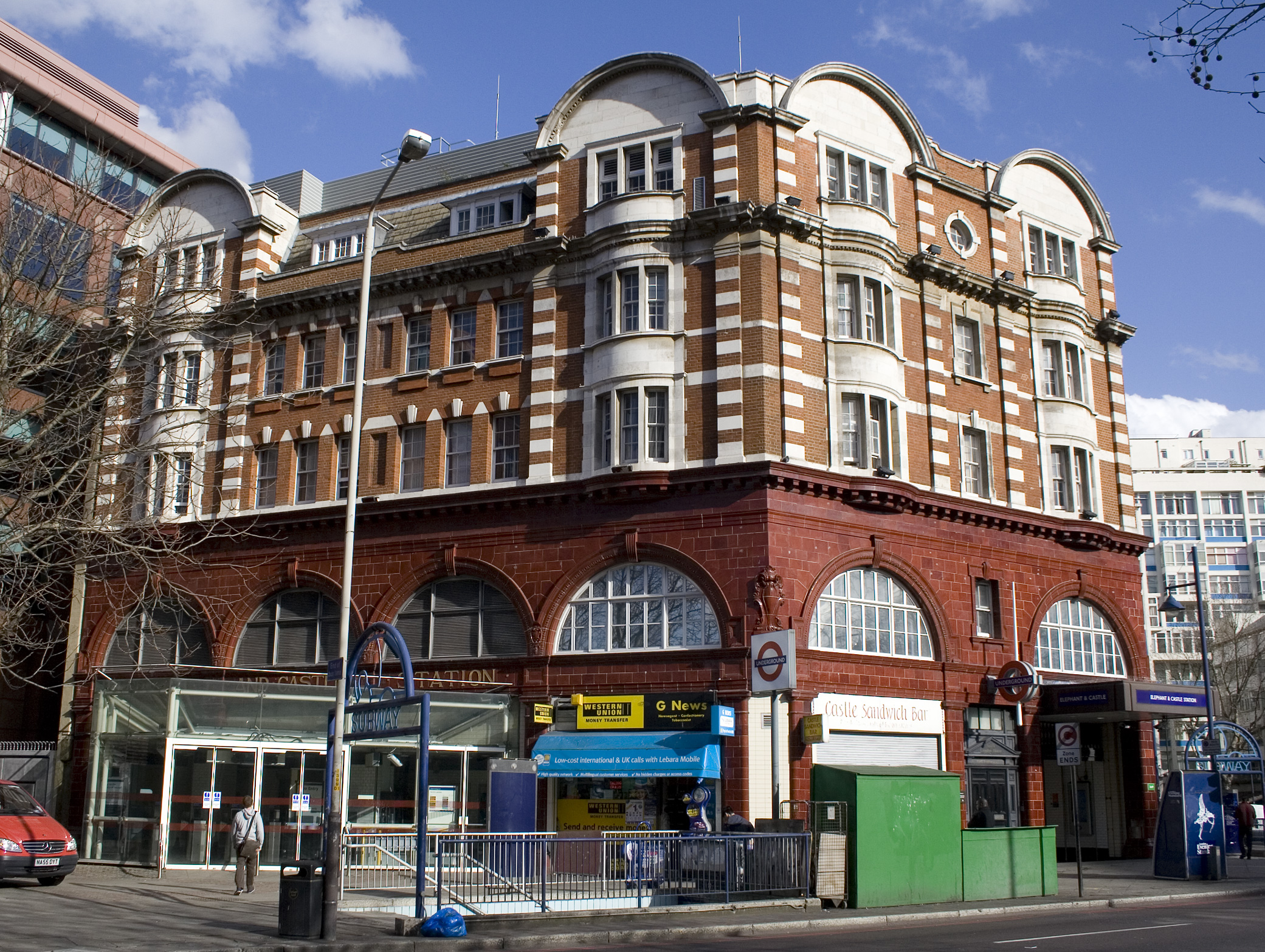 Period ox-blood red Bakerloo Line station building at Elephant & Castle SE1