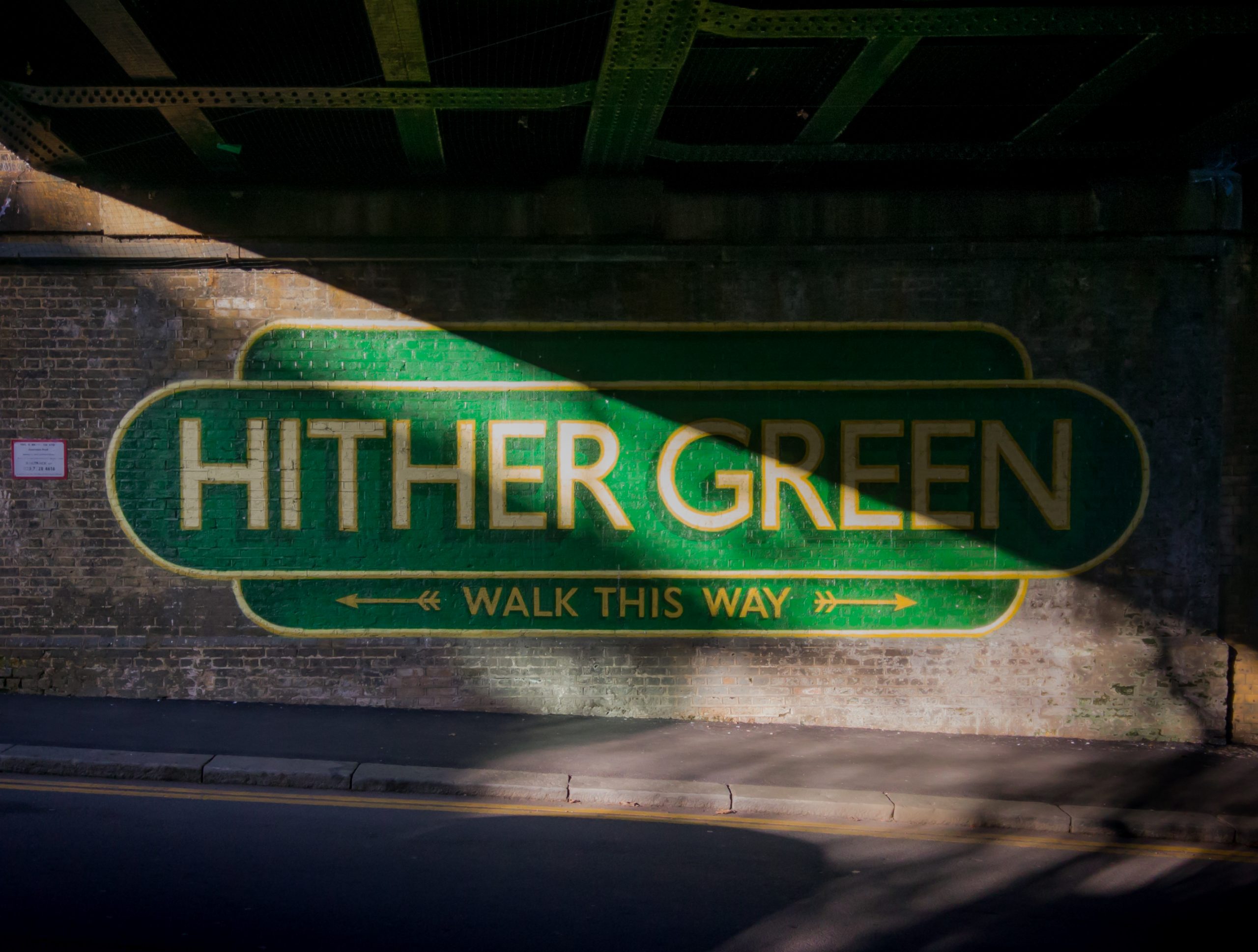 Green HITHER GREEN mural under the railway bridge in Hither Green SE13