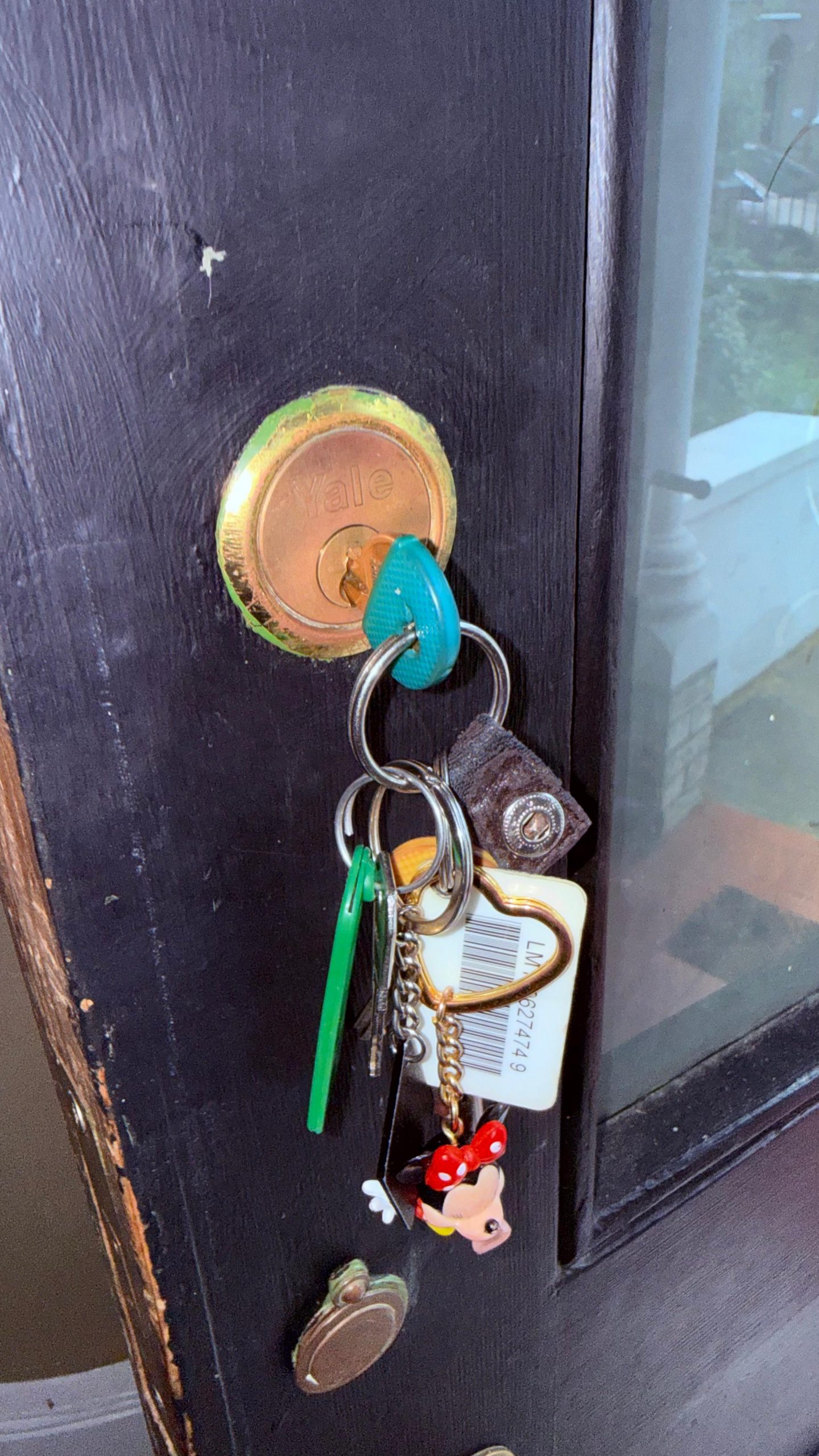 New Yale rim cylinder night latch fitted on a period front door in West Norwood SE27